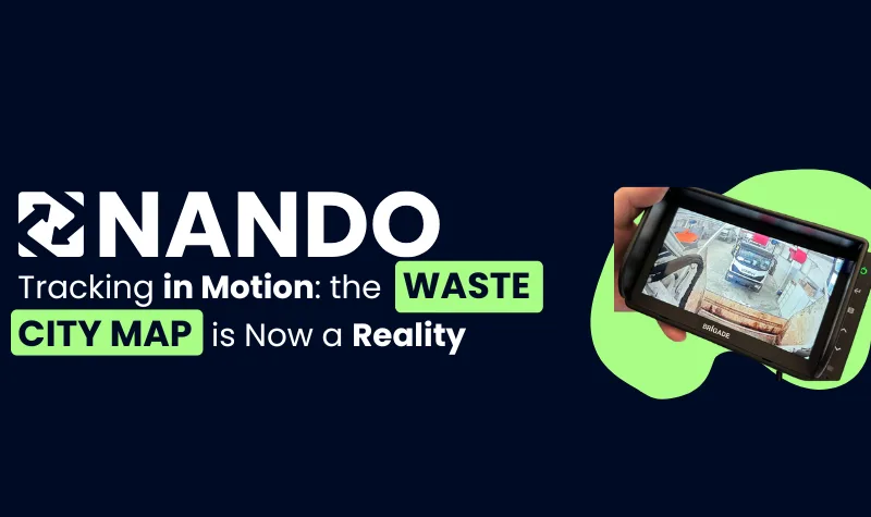 Image with a blue background, on the left the white NANDO logo and the title 'Tracking in motion: the Waste City Map is now a reality'. On the right, a monitor displays a truck in real-time while performing waste collection.